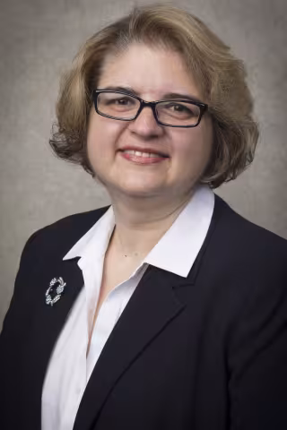 Laura Racovita, PhD, MSW